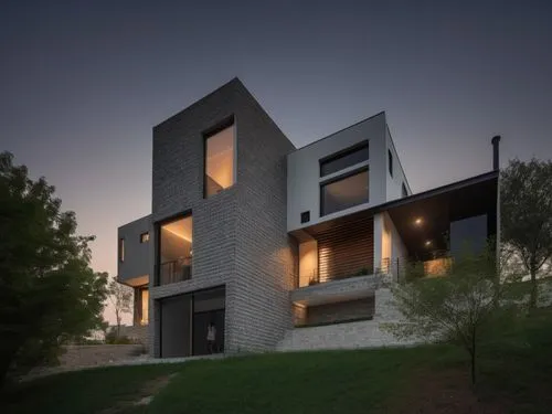 Minimalist two-story house with a basement. Located in a rural area full of vegetation. The house has a mix of styles between minimalist and industrial. With modern and minimalist exterior lighting.,T