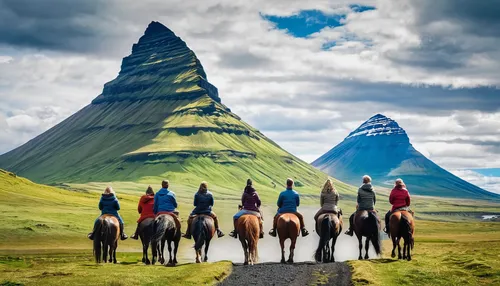 Tourists ride horses at Kirkjufell during Icelandic summer. Image credit: Blue Planet Studio/Shutterstock.com,iceland horse,kirkjufell,faroe islands,horse herd,icelandic horse,icelanders,eastern icela