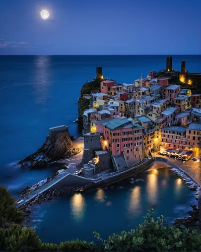 A view of Vernazza bathed in the moonlight. Taken about 30 minutes before sunrise from the trail that from Vernazza goes to Monterosso al Mare in the Cinque Terre, Italian Riviera, Italy,vernazza,ital