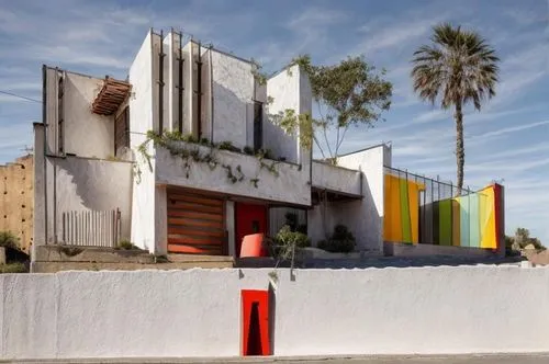 dunes house,mid century modern,syringe house,cubic house,mid century house,stucco wall,art deco,exposed concrete,tijuana,modern architecture,spanish missions in california,archidaily,palm springs,cube house,ruhl house,cube stilt houses,architectural style,colorful facade,stucco,house for rent,Architecture,General,Modern,Mexican Modernism