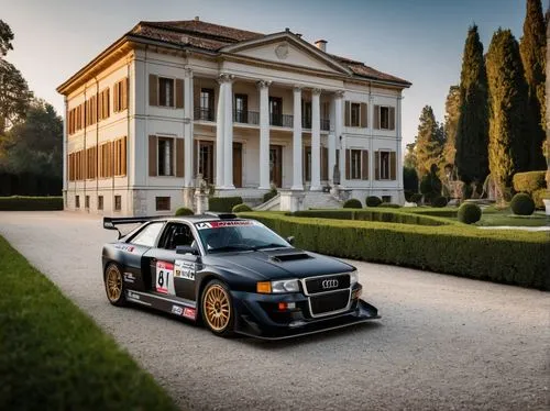 Black matte color, Audi Quattro, rally car, B-group, location on the driveway with in the background a neoclassical villa,manor,gumpert,mansion,bugatti,domaine,lancia,veyron,belvedere,meisterschaft,pa