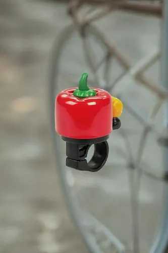 bicycle bell,haro,bike lamp,pomodoro,bicycle saddle,red bell pepper,bellpepper,roma tomato,bicycle lock key,fruit car,brake bike,hanging traffic light,red bicycle,red bell peppers,spoiled red bell pepper,balance bicycle,city bike,plant protection drone,bilobed,bell pepper