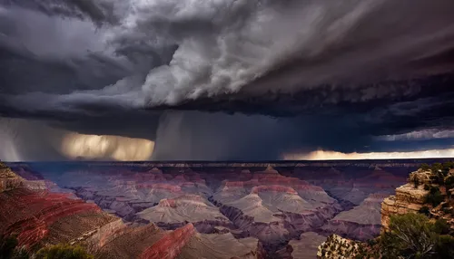 Ominous storm clouds full of rain rolling in over the Grand Canyon.,grand canyon,fairyland canyon,bright angel trail,monsoon,nature's wrath,south rim,united states national park,thundercloud,natural p