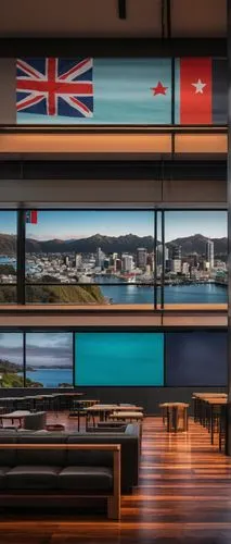 Wellington City Gallery, modern architecture, glass walls, steel frames, wooden floors, minimalist interior, projector screen, film festival posters, 2019 banners, audience seating, coffee tables, cit