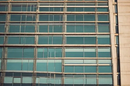 Retro 1960s architecture style, brutalist building, geometric shapes, concrete structure, glass windows, metal frames, industrial texture, urban cityscape, afternoon sun, soft shadows, minimalist comp