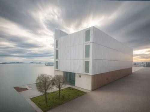 autostadt wolfsburg,glass facade,modern architecture,art museum,kennedy center,lake balaton,balaton,house of the sea,futuristic art museum,danube bank,lake constance,elbphilharmonie,cubic house,artsci