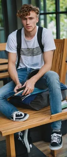 male, young adult, 20s, student, bachelor of design in architecture, UBC, casual wear, denim jeans, white T-shirt, black sneakers, backpack, laptop, books, sitting, studying, indoor, university campus