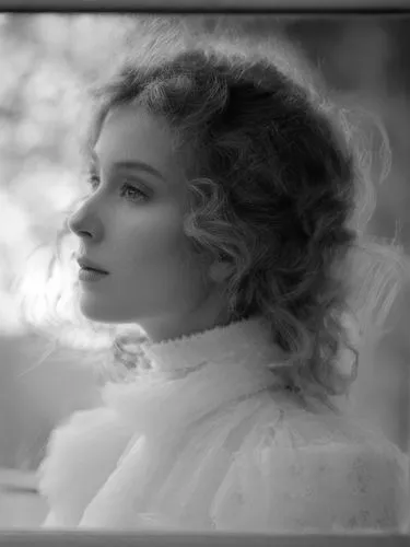 Black and white photo portrait of a lady, very close up.,an old po of a young woman,mary pickford - female,lillian gish - female,mary pickford,edwardian,yakimova,vintage female portrait,Photography,Bl