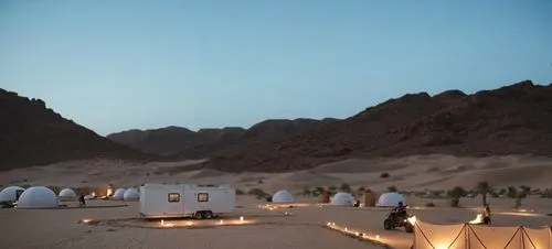 saudi arabia desert background,a desert with some white tents in it,wadirum,amanresorts,wadi rum,nuweiba,timna park,moon valley