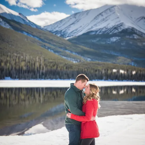 Winter Colorado destination engagement photo session on frozen Lake Dillon | Peak One and Buffalo Mountain | Keeping Composure Photography,swiftcurrent lake,fairmont chateau lake louise,maligne lake,j