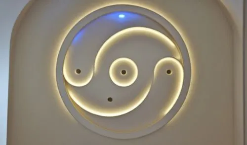 Gypsum decoration in the ceiling of a room with hidden LED lighting
Decor out of the ceiling
,an unusually designed sign is pictured at the entrance,eero,wall lamp,wall light,wifi symbol,om,dental ico