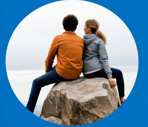 a couple sit on a rock and look into the distance,couple silhouette,skype logo,paypal icon,mytravel,ctrip,okcupid