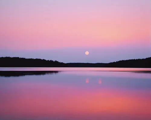 Discover a serene and peaceful gif that depicts a beautiful sunset over a calm lake.,pink dawn,evening lake,dusky pink,purple landscape,calm water,espoo,aurajoki,landscape photography,tarn,finland,pin