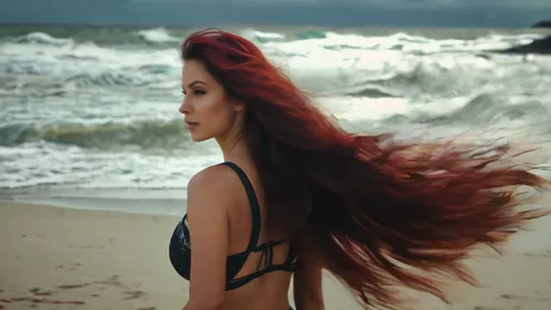 a beautiful girl walking along the beach. wind blow her messy long burgundy hair. H-Cup. She is looking at the camera. 4K video. ,dyesebel,aishwarya,beach background,ariel,mermaid background,sunsilk,s