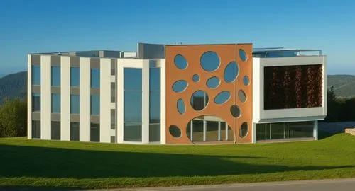 a comercial building
modern style,a modern building with circles on the outside,phototherapeutics,embl,biotechnology research institute,bocconi,new building,audencia,modern building,biozentrum,javeria