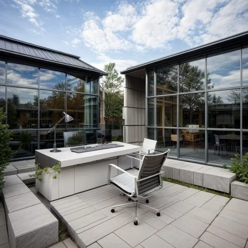 modern office,outdoor furniture,patio furniture,assay office,outdoor sofa,outdoor table and chairs,garden furniture,folding roof,offices,daylighting,roof terrace,outdoor table,chaise lounge,outdoor be