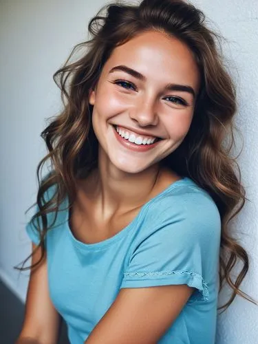 The most enchanting smile I've ever seen.,a  with long hair smiling and wearing a blue shirt,sonrisa,a girl's smile,beautiful young woman,smiling,invisalign,hazelius