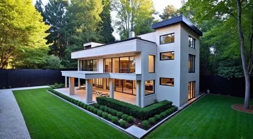 variety of innovative and stylish modern front yard landscaping ideas to elevate your outdoor space,the house is large and very modern,modern house,modern architecture,lohaus,cube house,beautiful home