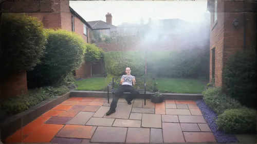 alfresco,garden ornament,man on a bench,chimney sweep,digital compositing,roof garden,garden swing,in the garden,garden furniture,roof terrace,artificial grass,album cover,red bricks,image editing,hollyoaks,throne,girl in the garden,chromakey,the garden,the throne