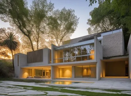 In a spacious masterful study, a minimalist house with a minimalist style exudes relaxation and beauty. The facade of the house is adorned with intricate concrete facades and plush carpet, with polish