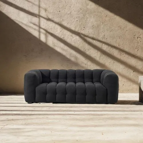 a black couch sitting next to a wall,minotti,sofa,sofa set,armchair,loveseat,cassina,danish furniture,chaise lounge,natuzzi,seating furniture,soft furniture,ekornes,new concept arms chair,sofas,uphols