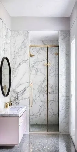 luxury bathroom,modern minimalist bathroom,marble,shower bar,shower door,bathroom,bathroom cabinet,washroom,natural stone,shower base,polished granite,almond tiles,gold stucco frame,shower panel,marble palace,contemporary decor,interior modern design,metallic door,hinged doors,modern decor