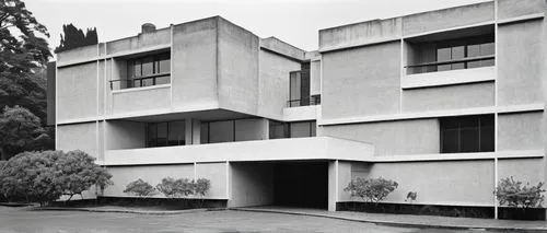 Modernist architectural style, Le Corbusier's Five Points, Pilotis, free plan, functionalism, rectangular shape, reinforced concrete, white walls, strip windows, roof garden, ramps, functional simplic