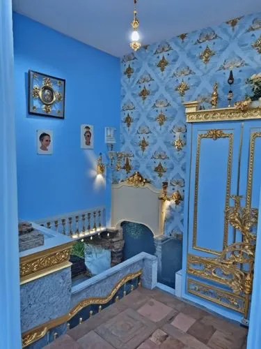 a bathroom with blue walls and gold trimmings,children's bedroom,victorian room,ornate room,antechamber,bedchamber,Photography,General,Realistic