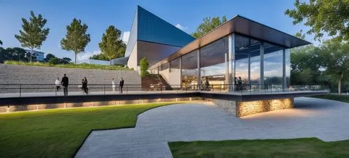 DISEÑO EXTERIOR DE UN RESTAURANT PARA UNA NAVE INDUSTRIAL, CON UNA ESTRUCTURA  A BASE DE COLUMNAS CIRCULARES DE ACERO AL CARBON,  AMPLIOS VENTANALES DE CRISTAL ,  TERRAZAS CON MUROS DE PIEDRA ESCALONA