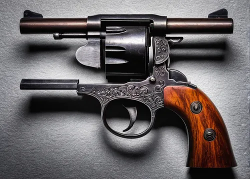 A vintage revolver displayed in a museum exhibit.,colt 1873,smith and wesson,vintage pistol,colt 1851 navy,gun accessory,a pistol shaped gland,revolvers,air pistol,45 acp,firearm,handgun,colt,india gu