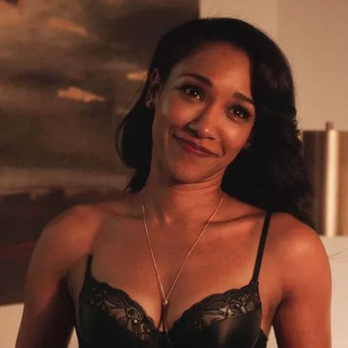 give her a black push up bra
,a woman standing in front of a picture and smiling,tracee,thandie,fineness,cathey,demetrias,lisaraye