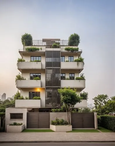 Modern nature themed apartment with terrace gardens and sustainable green building.

The name of this apartment is "Subhiksha Vinoba Garden" which is displayed at the top.

Terrace garden at the top f