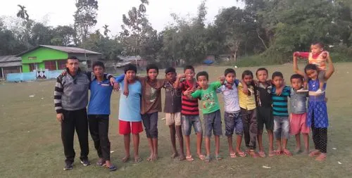 Group photo in the outside field,some children pose for the camera on the grass,kabbadi,kabaddi,oraon,silambam,young swimmers,goalpara,kabadi,savar,sporting activities,birbhum,lakshmipur,habiganj,spor