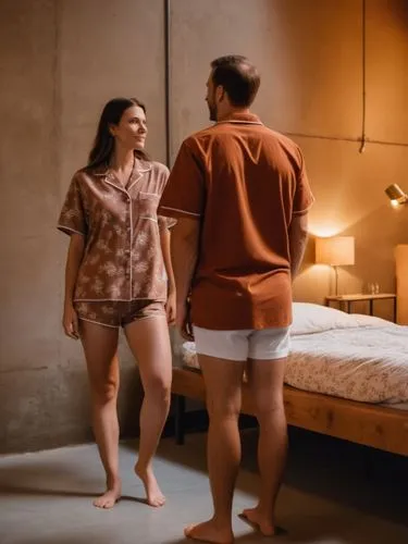 A busty woman in a short-sleeved pyjama shirt and thong is in the foreground. Her husband in the center. Room of warm sienna color, industrial dorm interior, cozy atmosphere, wooden bunk beds, metal f