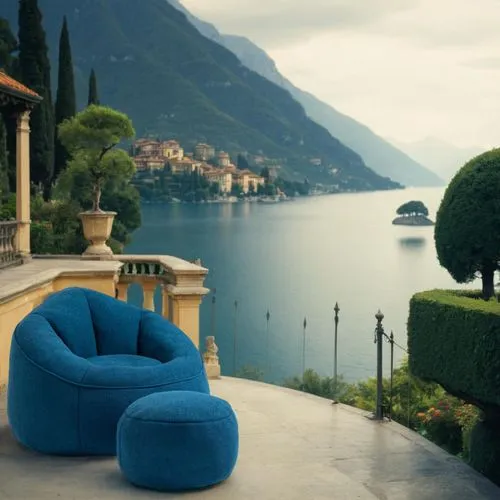 科幻,a modern, brightly colored round chair is sitting on a patio near the water,natuzzi,chaise lounge,lake como,chaise,cassina,cappellini