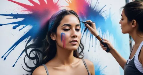 Woman  is spray painted art.,a woman is getting her makeup done with a brush,airbrushing,airbrush,applying make-up,airbrushed,painting technique,art painting