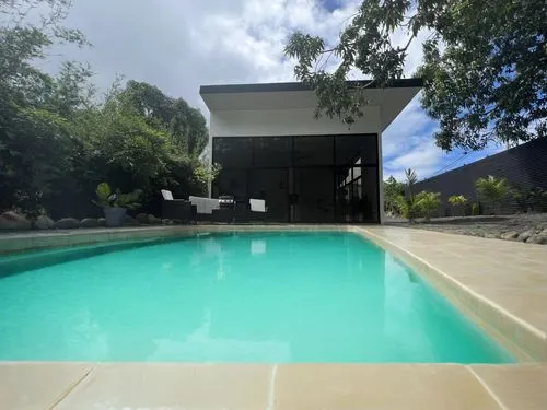 fill the pool with turquoise transparent water,pool house,landscape design sydney,outdoor pool,landscape designers sydney,swimming pool,holiday villa,dug-out pool,pool water surface,corten steel,dunes