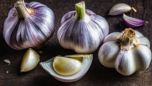 In a health-conscious household, garlic bulbs are used in various recipes for their numerous health benefits.,clove garlic,cultivated garlic,a clove of garlic,sweet garlic,garlic bulbs,garlic,garlic c