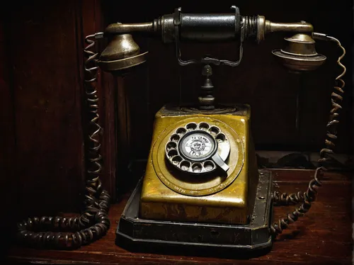 Imagine an abandoned rotary phone mysteriously ringing in a haunted house.,vintage telephone,telephone handset,telephone accessory,telephone,old phone,telephone hanging,landline,conference phone,telep