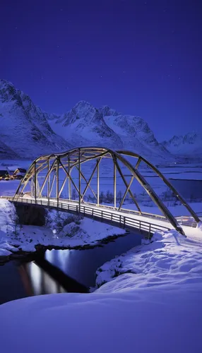 Fredvang Bridge at night in winter with covering of snow, Lofoten, Arctic, Norway, Europe,snow bridge,swing bridge,bailey bridge,viola bridge,humpback bridge,eastern iceland,scenic bridge,segmental br