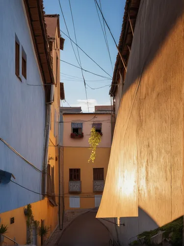 narrow street,casa fuster hotel,alleyway,riad,outdoor street light,street lamp,old linden alley,alley,zona colonial,street lamps,goldenlight,lipari,townhouses,street light,majorelle blue,malaga,hangin