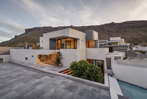 “Create a second floor detached house and behind a mountain with the blue sky at the end of the day. The house is in the northwest of Tenerife.”,dunes house,modern architecture,modern house,south afri