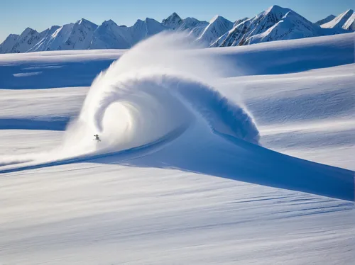 Illumination<br /> <br /> Travis Rice slashes a snow wave near the end of the day in the Tordrillo Mountains of Alaska while filming for the Art of Flight movie. This was the last image I took after m