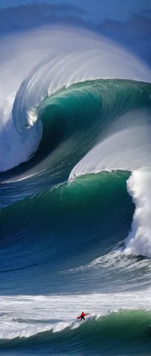 A surfer drops in on a large wave at Praia do Norte in Nazare, Portugal, November 29, 2015. The Praia do Norte beach has become a famous beach for big waves surfers around the world since Hawaiian sur