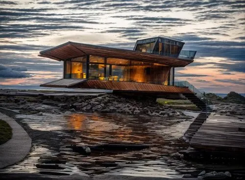 house by the water,dunes house,snohetta,stilt house,beach house,lifeguard tower,floating huts,house with lake,boat house,cubic house,cube stilt houses,mirror house,cantilevers,houseboat,mid century ho