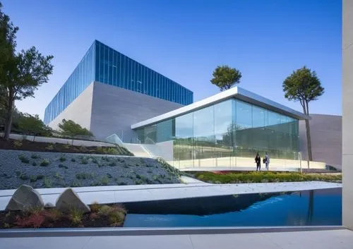 two people are walking past a building with glass,modern architecture,modern house,futuristic art museum,cube house,aqua studio,koolhaas,Conceptual Art,Sci-Fi,Sci-Fi 10