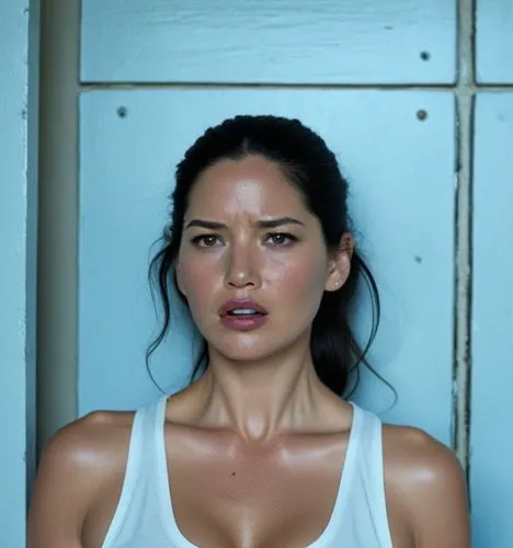 Olivia Munn wearing a shirt.

Olivia Munn is an CIA agent. She is attempting to apprehend a suspect.
She aims her pistol at a male prisoner.

Location: Prison.








,woman in white tank top against