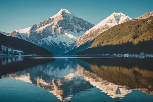 Craft a 32x32 pixel art of a tranquil lake reflecting snow-capped mountains.,glacial lake,morskie oko,british columbia,hintersee,canadian rockies,lake moraine,emerald lake,alpsee,alpine lake,mountain 