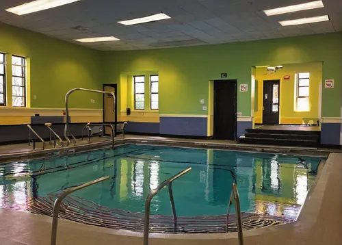 Describe a peaceful morning at the McGrath YMCA.,leisure centre,aqua studio,leisure facility,fitness center,swimming pool,facility,recreation room,thermal bath,dug-out pool,gymnastics room,swim ring,t