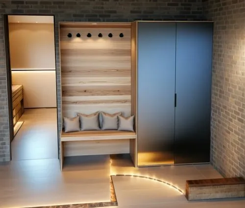 entrance furniture, wooden interior, stone wall, warm lighting, minimalist design, relaxation space, quiet atmosphere, bench, wardrobe, wellness concept,a room with brick wall, doors, and a wooden ben